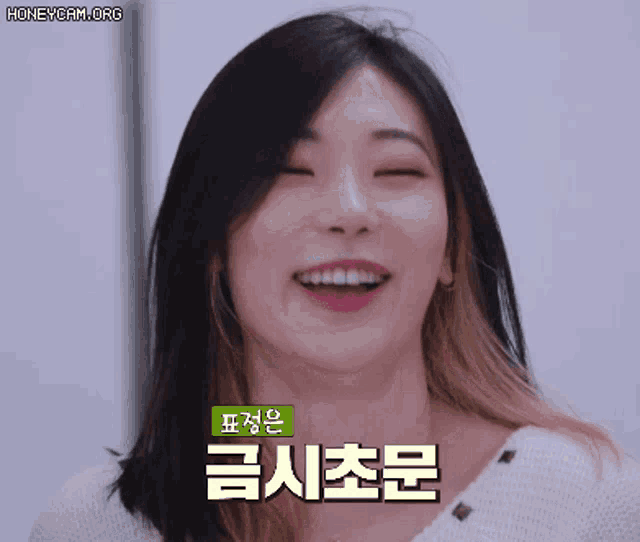 a woman with korean writing on her face
