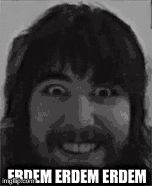 a black and white photo of a man with a beard and the words erdem erdem erdem .