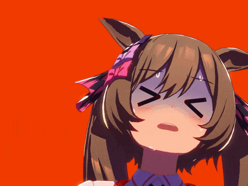 a close up of a girl with a bow on her head