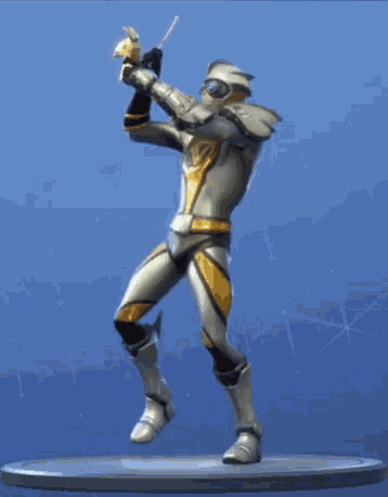 a man in a knight 's armor is dancing on a platform .