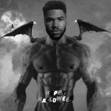 a black and white photo of a man with bat wings and the words happy halloween below him
