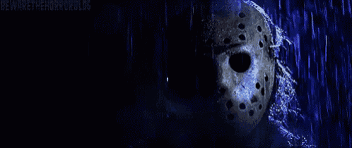 jason voorhees is wearing a hockey mask in the rain