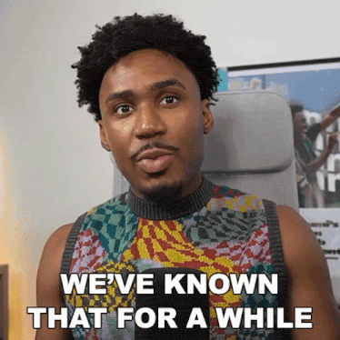 a man sitting in a chair with the words we 've known that for a while