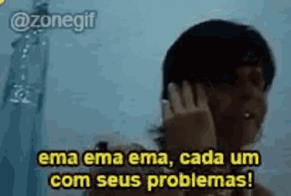 a woman is taking a shower and covering her face with her hands and says ema ema ema cada um com seus problemas