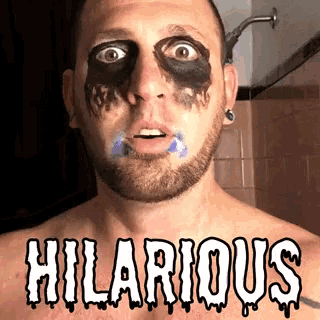 a man with black paint on his face and hilarious written below him