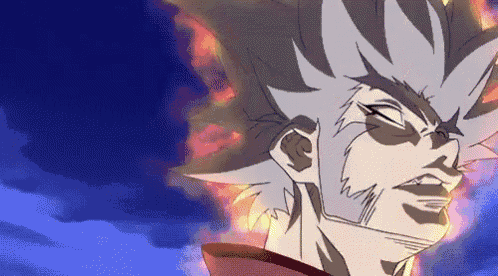 a close up of a person 's face with fire coming out of his hair