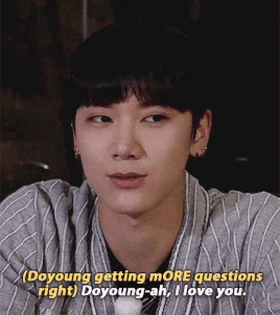 a young man says doyoung getting more questions right