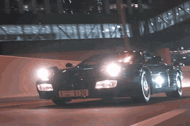 a black car with a license plate that says s5120