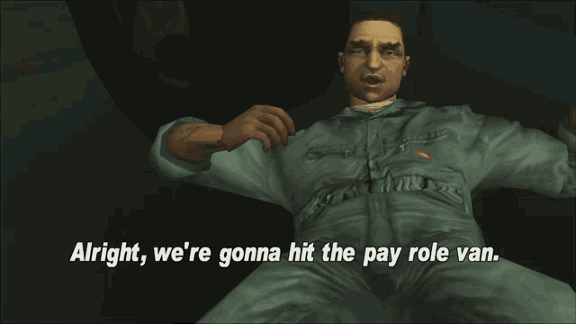 a man in a jumpsuit is laying down and says alright we 're gonna hit the pay role van
