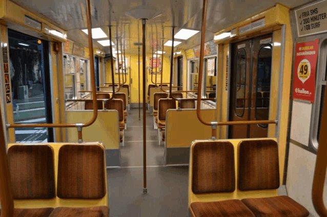 the inside of a subway car with a sign that says 49