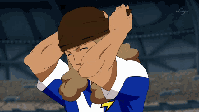 a man in a blue and white shirt with a lightning bolt on his chest is on a tv screen that says bs japan