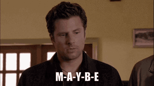 a man says " m-a-y-b-e " in a room