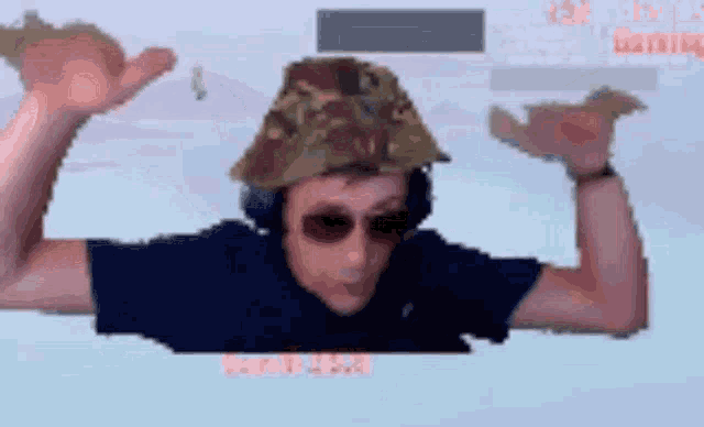 a man wearing a hat and sunglasses is flying through the air