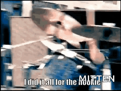 a blurry picture of a man with the words i did it all for the mitten on the bottom