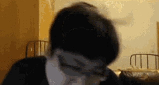 a close up of a person 's face with glasses on .
