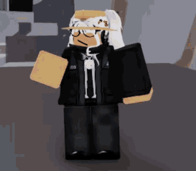 a roblox character wearing a hat and glasses is standing in a dark room .