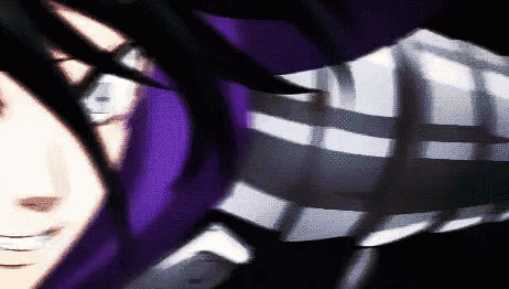 a close up of a person with purple hair and a striped shirt