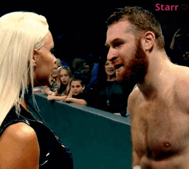 a man and a woman are standing next to each other and the word starr is on the bottom