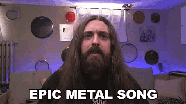 a man with long hair and a beard has the words epic metal song written on his face