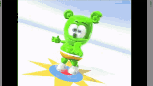 a gummy bear is standing on a circle on a screen