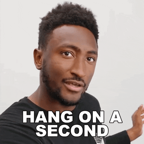 a man with the words hang on a second written on his face