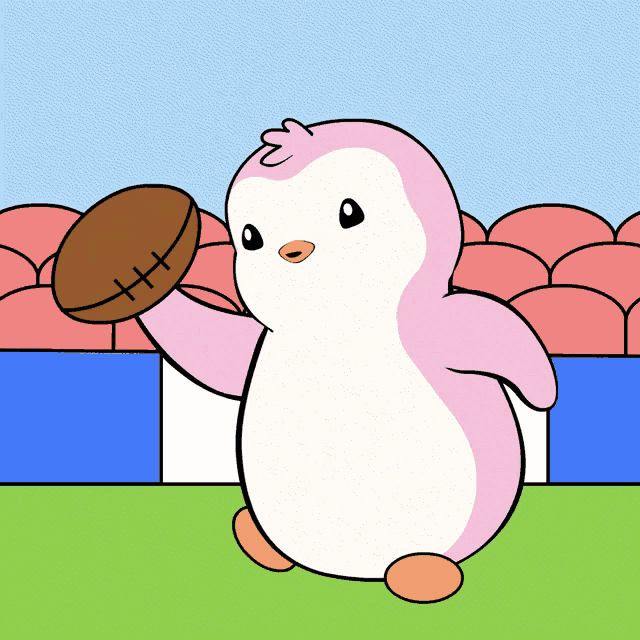 a pink penguin is holding a brown football with a stitched x on it