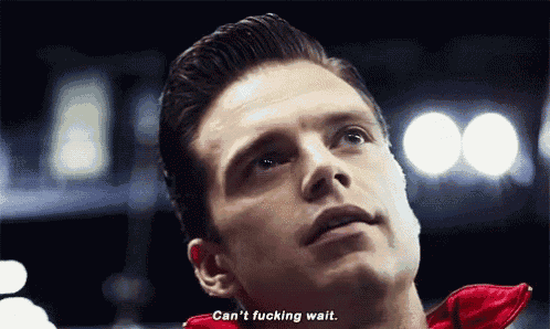 a close up of a man 's face with the words `` can 't fucking wait '' written on his face .