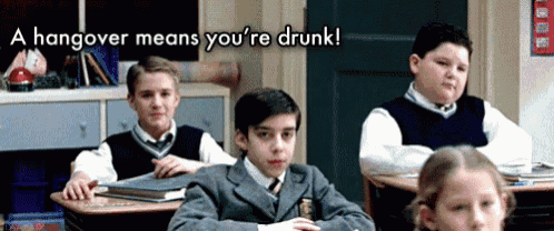 a hangover means you 're drunk written above a group of students
