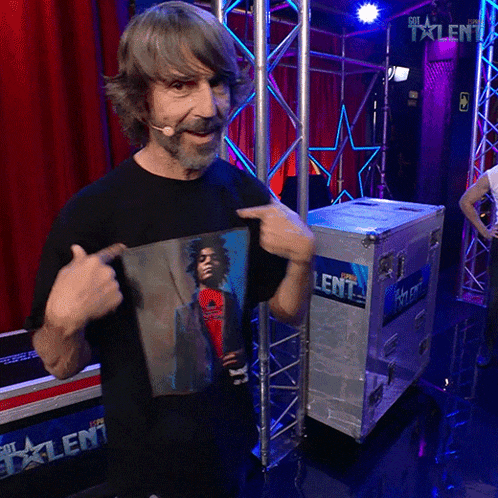 a man wearing a t-shirt with a picture of a man on it