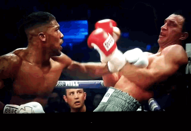 two boxers are fighting in a ring with a bbc logo on the side