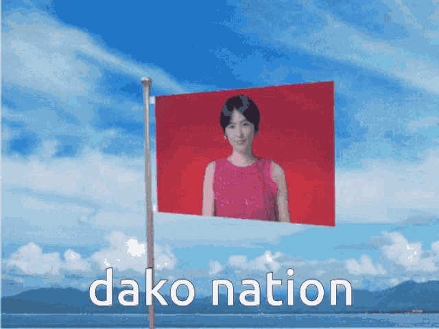 a red flag with a picture of a woman and the words dako nation
