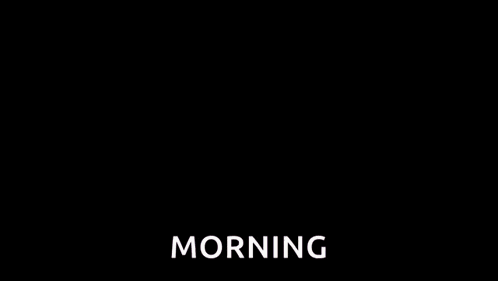a man with a beard is making a funny face and the word morning is on the screen .