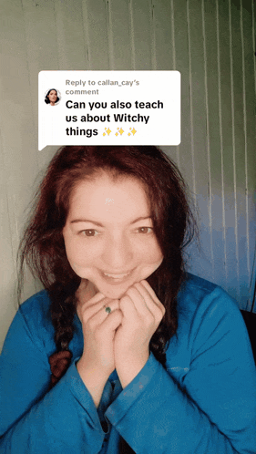 a woman in a blue shirt has a reply to callan_cay 's comment on her face