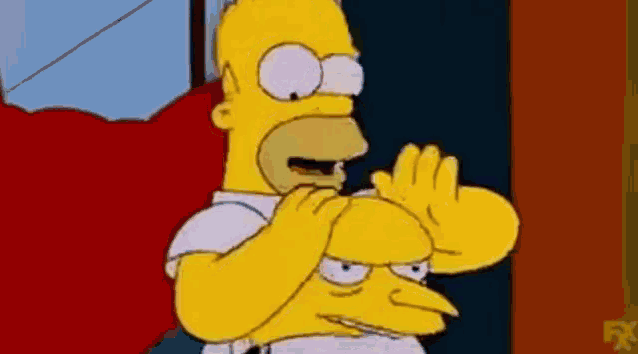 homer simpson from the simpsons is making a funny face while sitting on a chair .