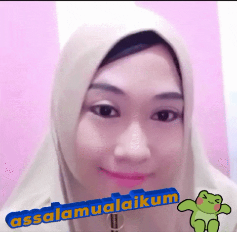 a woman wearing a hijab is smiling with the words assalamualaikum in the background