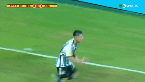 a soccer player is kneeling down on the field during a game between brazil and argentina
