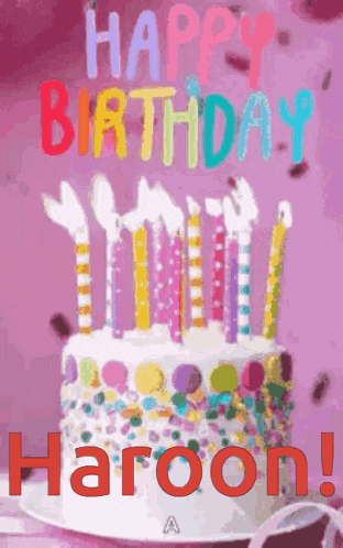 a birthday cake with candles on it and the words happy birthday haroon