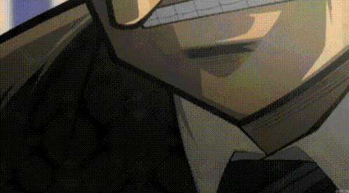 a close up of a man 's face with glasses and a suit
