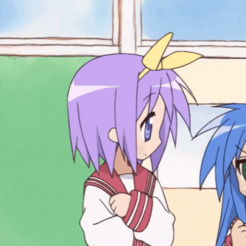 a girl with purple hair is standing next to another girl with blue hair