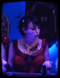 a woman in a vampire costume is asking did you do the thing