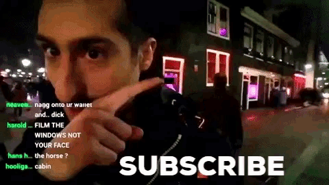 a man covering his face with his hand and a sign that says subscribe on it
