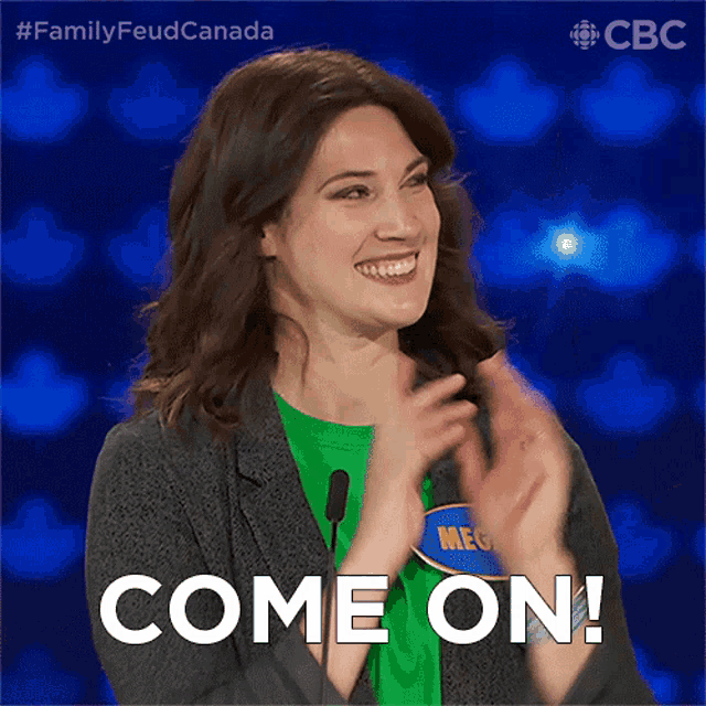 a woman in a green shirt applauds with the words come on