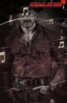 a man in a red shirt is standing in front of a poster that says divine one