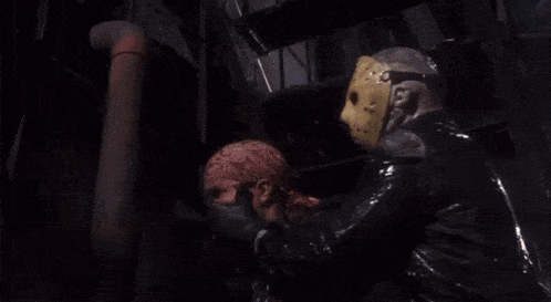 jason voorhees is wearing a hockey mask and standing in the fog