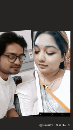 a man and a woman are looking at each other on a cell phone screen