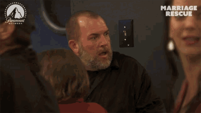 a paramount network advertisement for marriage rescue shows a man talking to a woman