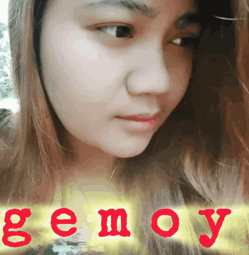 a close up of a woman 's face with the word genoy in red letters