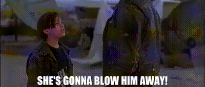 a man and a girl are standing next to each other and the girl is saying `` she 's gonna blow him away '' .