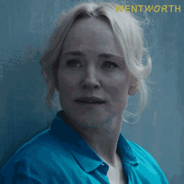 a close up of a woman 's face with the word wentworth on the top