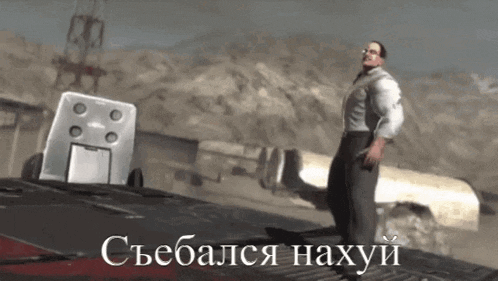 a man is standing on top of a building in a video game with a russian text .